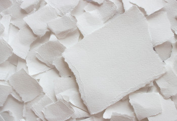 background of rough torn crumpled paper with gray and white