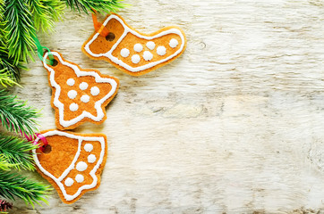 ginger biscuits and a branches of a Christmas tree