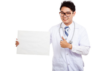 Asian male doctor thumbs up with blank sign