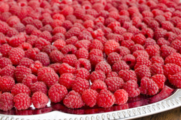 raspberries are on  metal tray