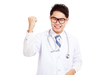 Asian male doctor happy hold fist up