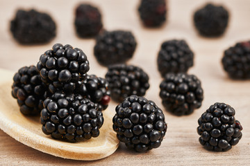 Blackberries scattered on a table