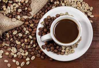 Coffee cup and jute sack full of coffee beans 5