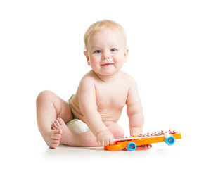 kid boy playing  with musical toy