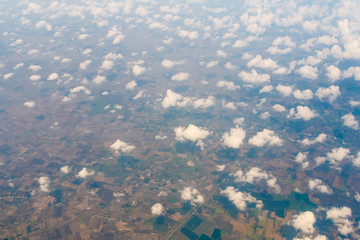 Aerial view of clouds and village © aiaikawa