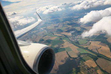 Naklejka na ściany i meble Beautiful cloud sky view from aeroplane window
