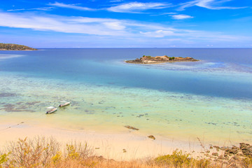 Aerial view of crystal clear water on tropical island