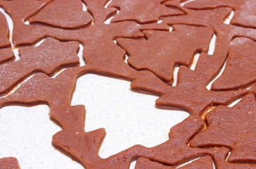 Dough for cookies in shape of christmas tree and star