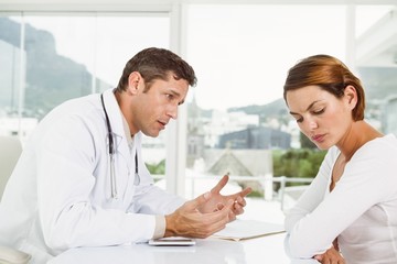 Doctor in discussion with patient in medical office