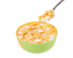 Bowl of corn flakes and milk.