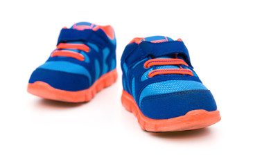 pair of blue sporty shoes for kid on white
