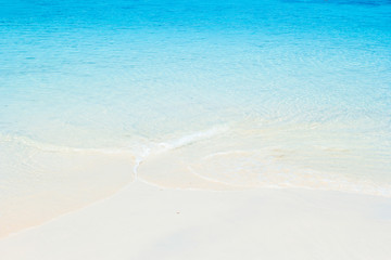Fototapeta na wymiar White sand beach and blue sea at andaman sea