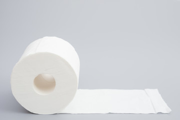 toilet roll on grey background