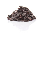 Black raisin over white background