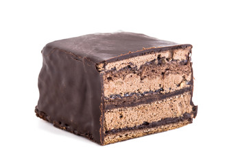 Sweet chocolate cake decorate with dark chocolate ship the image