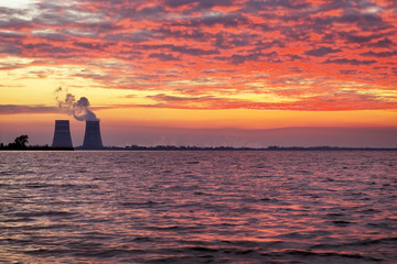 Beautiful landscape with reservoir and sunset sky