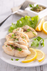 frog leg with parsley and salad