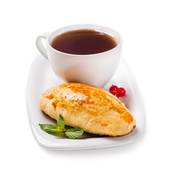 Pie with jam and black tea for breakfast