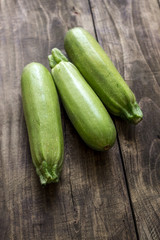 Fresh zucchin on a old wooden board