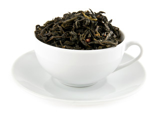 black leaves tea in cup
