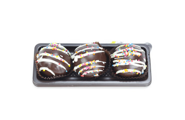 chocolate ball with topping in paper cup