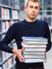 Stressed student in a library