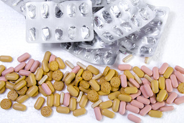 Spilled drugs on white background