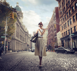 Fashionable girl walking in the streets