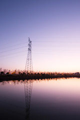 Fototapeta premium high voltage transmittion tower and landscape
