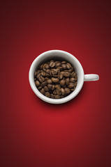 Obraz premium Grãos de Café na xícara