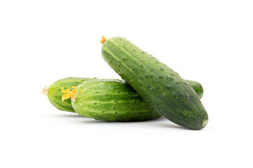 Cucumber and slices isolated over white background