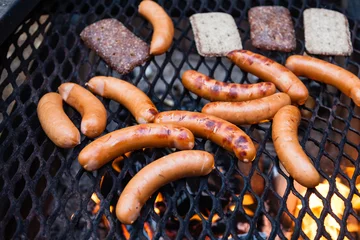 Photo sur Plexiglas Grill / Barbecue Big sausages on grill