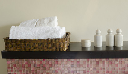 close-up basket of pure white spa towels