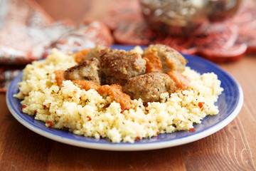 Meatballs with couscous and vegetable sauce