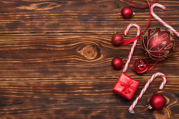 Christmas Decorations. Gift Box. Candy Canes. Wooden Background
