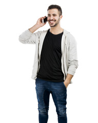 Fototapeta premium Young man talking on cell phone