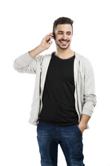 Fototapeta premium Young man talking on cell phone
