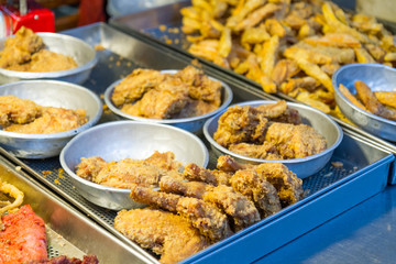 Fried chicken and squid at traditional market in Taiwan