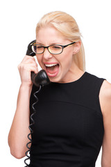 Screaming young business woman with telephone