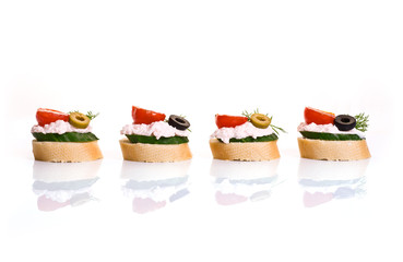 Canapes with Crab Cream, Cherry Tomatoes, Cucumber and Olives