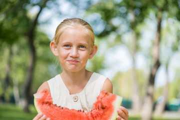Kid with watermelon slice