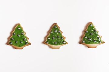 Christmas handmade cookies trees on white background