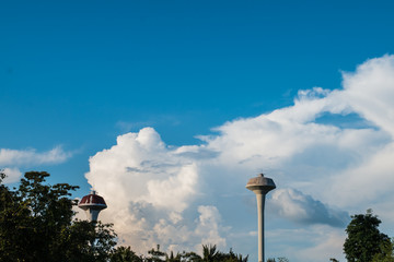 Two water tank tower On a cloudy sky