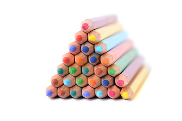 Pyramid of color pencils isolated over white