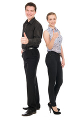 Side view portrait of happy couple showing thumbs up sign while