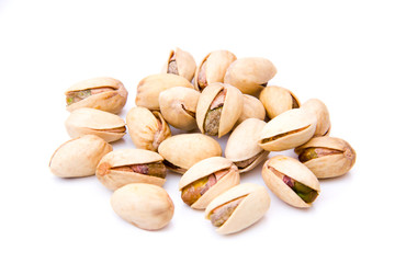 Pistachios on white background viewed from front