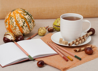 Opened Notebook. Cup Of Hot Tea With Sweets. Natural Linen Table