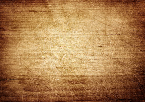 Fototapeta Dark scratched grunge cutting board.