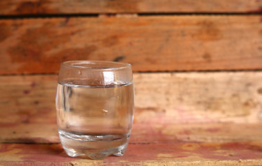Shot of vodka in a crate