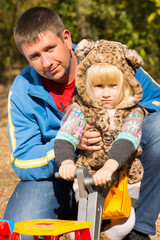 Cute little girl in a cat suit